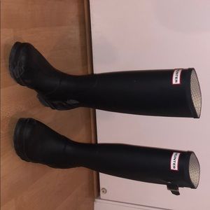 Tall black Hunter rain boots